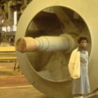 A Sunday Open House with several employee family members seen near a large centrifugal fan.