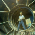 Welder is standing inside the axial housing.