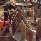 Airfoils being welded to the centerplate.