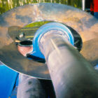 Shaping a side plate on a roller.