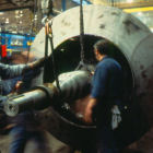 Harness and chains are secured to shaft prior to moving it.
