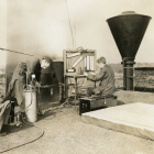 Engineers from the Dust Lab taking readings on the roof.